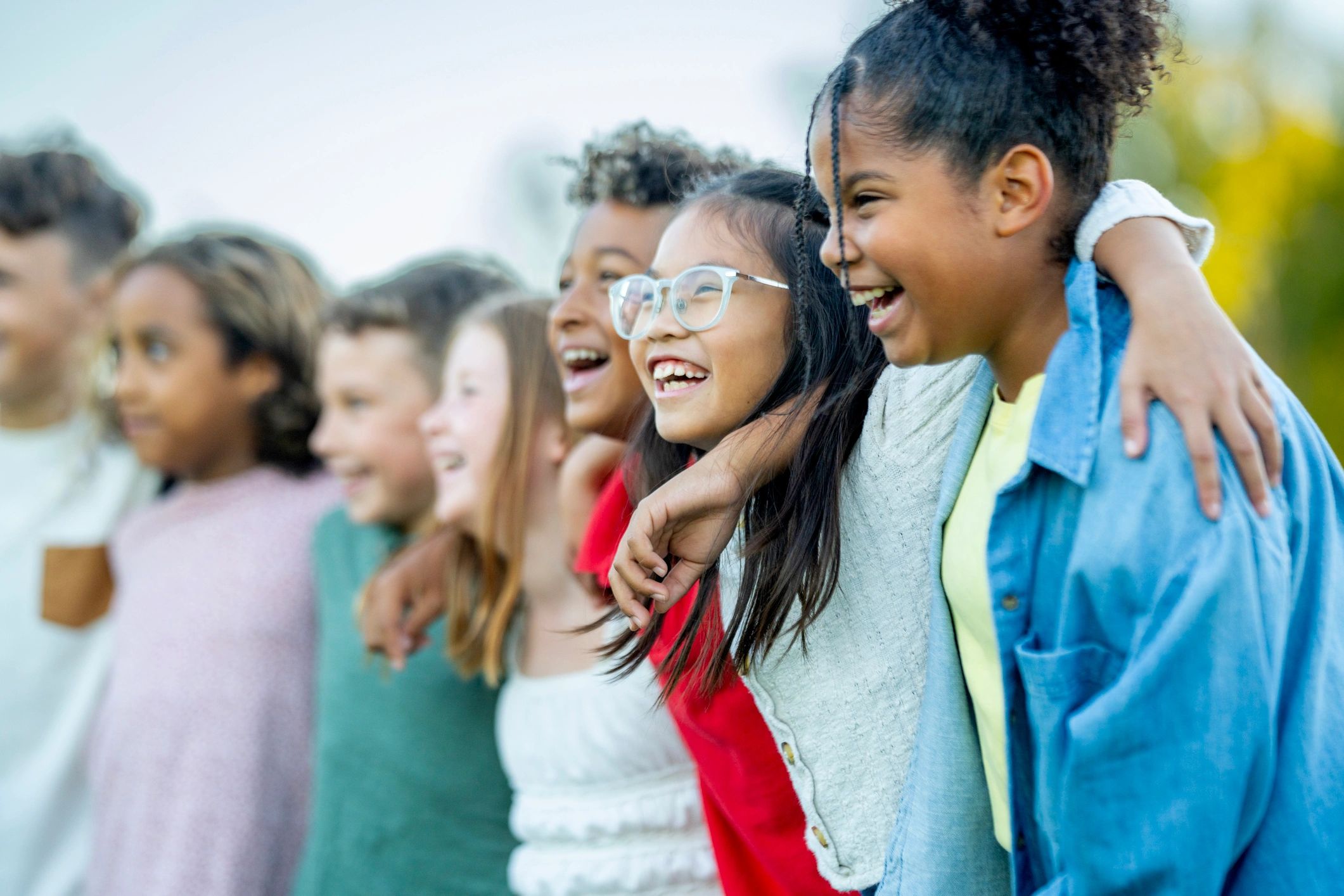 Children smiling together outdoors